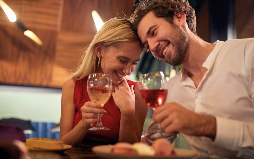 A young couple in romantic moments at Valentine's day celebration in restaurant in a relaxed atmosphere. Together, Valentine's day, celebration